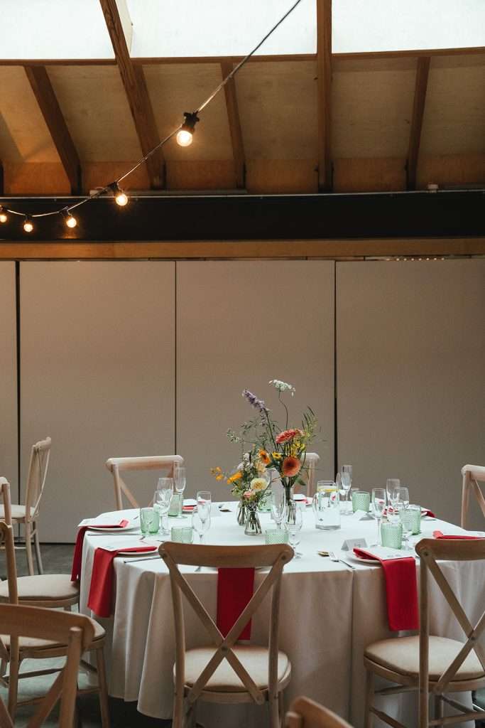 “Close-up of floral arrangements and table styling at The Glass House Hackney by Bloom East.”